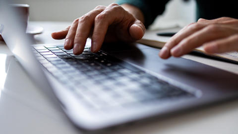 Typing on a laptop keyboard